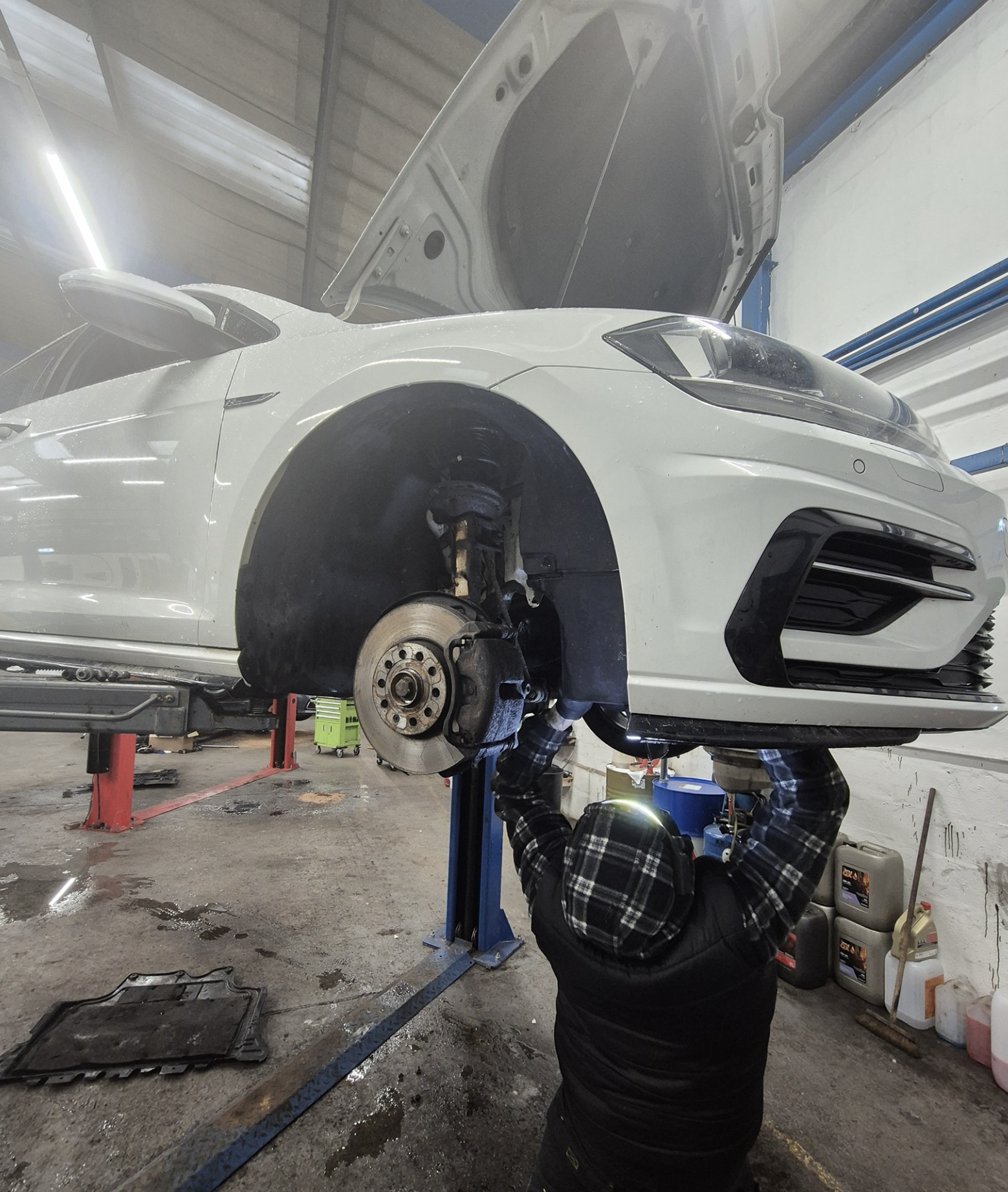 East Coast Garage mechanic working on vehicle